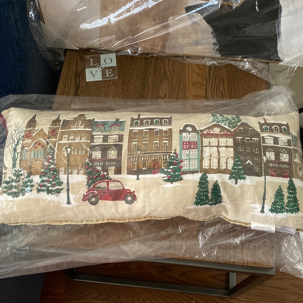 Firm and fluffy Christmas pillow by Santa’s workshop. Never used.